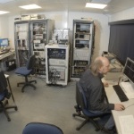 Control room of the Glasgow 10m interferometer. One of the rare pictures of Stefan pretending to do some actual work.